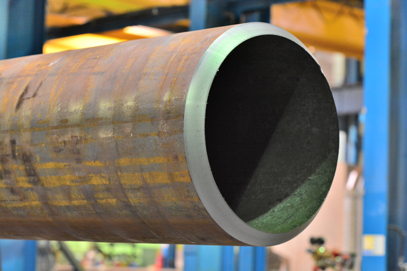 Rolled and welded steel pipe
